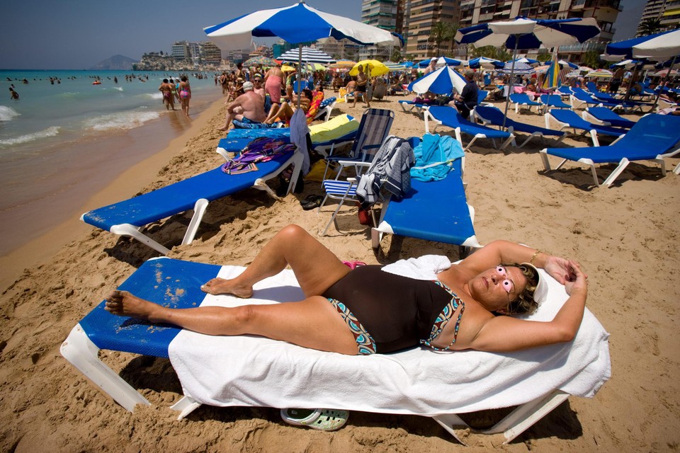 Zon en zee: minder doorslaggevend voor Belgen dan het budget.